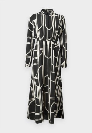 Sort maxikjole med lange ærmer, hvide abstrakte geometriske linjer, knaplukning ved kraven, sammensnøring i taljen og en strømlinet nederdel.
