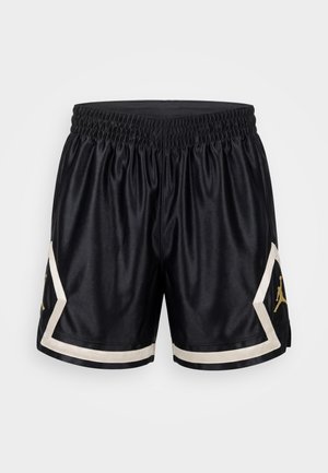 Czarne spodenki do koszykówki z elastycznym paskiem, białym obszyciem po bokach i na dolnej krawędzi oraz złotym logo Jumpman na każdej nodze.