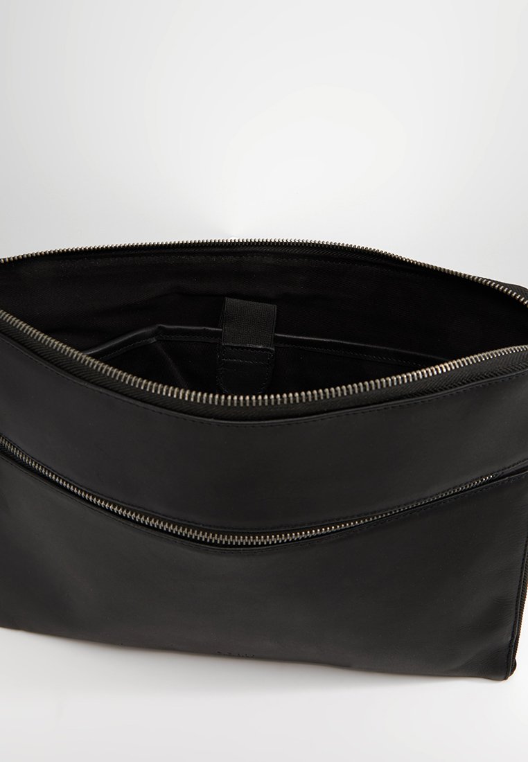 coach computer sleeve