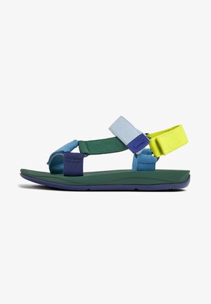 Sandal med remme i flere farver i blå, grøn, lilla og gul; gummisål med en buet, polstret profil.