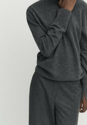 Stickad tröja - grey