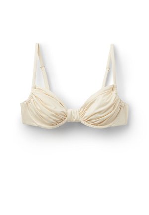 Soutien-gorge en satin couleur crème avec bonnets froncés et bretelles fines réglables sur fond blanc.