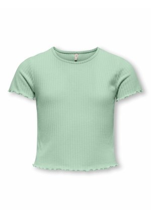 Haut vert menthe à manches courtes en tissu côtelé. Il présente un col rond et des bords festonnés aux manches et à l'ourlet.