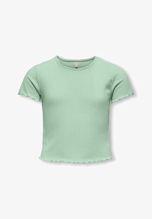 Haut vert menthe à manches courtes en tissu côtelé. Il présente un col rond et des bords festonnés aux manches et à l'ourlet.