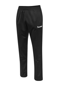Czarne spodnie sportowe z elastycznym pasem i białym logo "hummel" na górnej lewej części uda, proste nogawki, gładka faktura materiału.