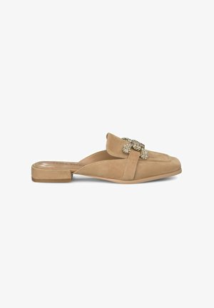 Beige suede mule with a low block heel, featuring a decorative jewel-embellished bow on the upper and a rounded toe design.