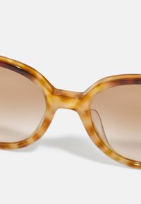 COACH Gafas de sol - caramel/snow