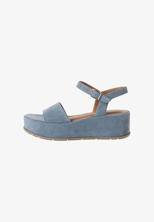 Light blue suede platform sandals with an ankle strap, featuring a square toe and a wide front band, set on a beige rubber sole.