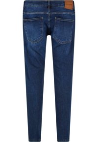 Mršave traperice u tamnoplavom denimu. Imaju pet džepova s kontrastnim šavovima. Pojas na leđima ima smeškanu kožnu oznaku.