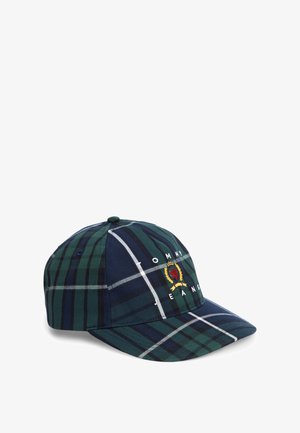 Czapka z daszkiem z zielonym i granatowym wzorem w kratę, haftowany herb i tekst "Tommy Jeans" na przednim panelu.