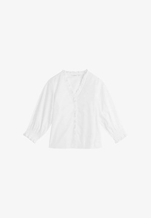 Witte blouse met een V-hals, geplooide randen en knopen aan de voorkant. Heeft lange, licht verzamelde mouwen en een losse pasvorm. Zachte katoenen stof.