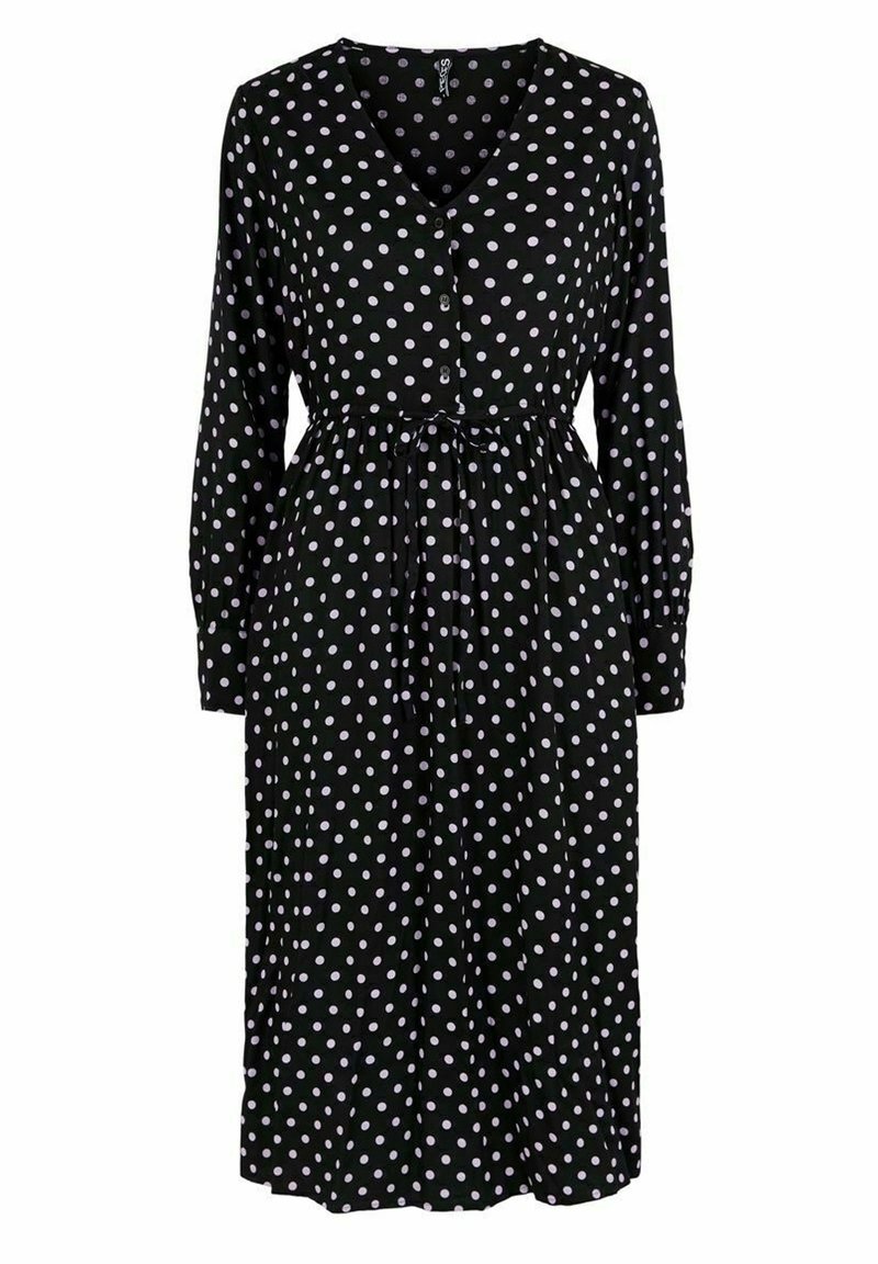 Svart klänning med prickar, långa ärmar, V-ringning, knäppning framtill, dragsko i midjan och en välsittande kjol. Har vita prickar över hela.