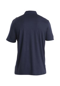 Polo blu navy, maniche corte e colletto. Tessuto morbido con una texture liscia. Nessun logo o motivo visibile sul retro.
