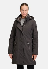 Dark gray waterproof parka with a zip and button closure, adjustable hood, two front pockets, and striped accents on pockets.