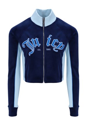 Giacca a zip cropped in navy e azzurro chiaro, caratterizzata da una texture liscia, accentuazioni a coste sulle maniche e logo "Juicy" ricamato in azzurro chiaro.