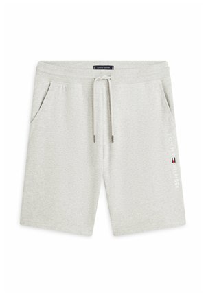 Pantaloncini in cotone grigio chiaro con coulisse in vita, tasche laterali e logo Tommy Hilfiger sulla gamba destra.
