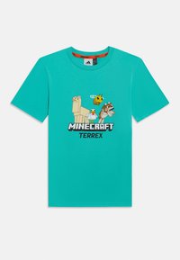 Τιρκουάζ βαμβακερό T-shirt με γραφικό Minecraft που απεικονίζει λάμα, μέλισσα και σκύλο. Έχει στρογγυλή λαιμόκοψη και λογότυπο Terrex στο γιακά.