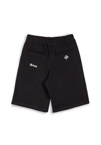 Pantalones cortos de algodón negro con un ajuste relajado. Presenta dos bolsillos traseros, una cintura elástica y un bordado blanco de "Primedy" encima del bolsillo derecho.