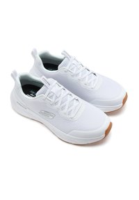 Pair of white Skechers mesh sneakers with gum rubber soles, lace-up closure, and branded side logo angled on white background.