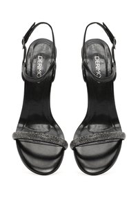 Sandali in pelle nera con punta aperta, design slingback e una fascia testurizzata e scintillante nella parte anteriore. Finitura liscia e lucida.