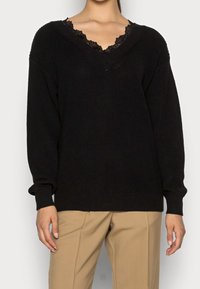 LASCANA Stickad tröja - black