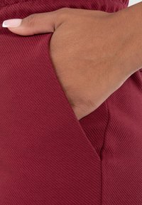 Smilodox FAYNE PRO - Pantaloncini sportivi - bordeaux