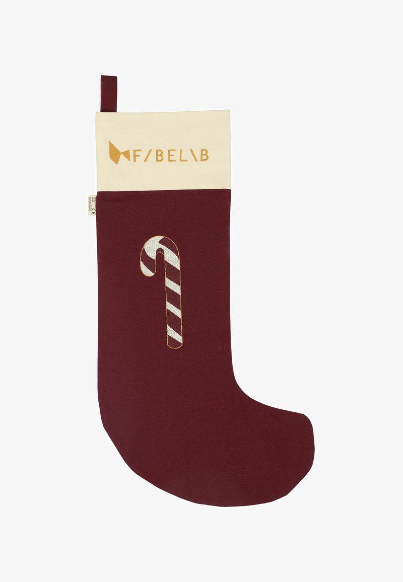 Burgundske nogavice s kremastim manšetom, ki vključujejo zlate vezenine in zasnovo črtaste sladkarije. Narejene so iz tkanine, mehke na otip.