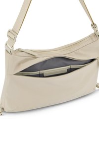 Borsa a tracolla beige realizzata in morbido tessuto, dotata di un comparto con zip e di una tasca interna con fodera grigia. Inclusa una tracolla regolabile.