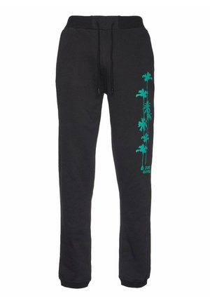 Black sweatpants with a drawstring waistband. Features a vertical green palm tree graphic on the left leg and ribbed cuffs at the ankles.