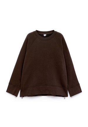 Dark brown long-sleeve sweatshirt with crew neck, dropped shoulders, wide cuffs, and small side zippers at the hemline.