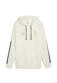 Hanorac de culoare crem cu sireturi negre, buzunar frontal și accente aurii la logo. Prezintă dungi laterale verzi cu model și mâneci raglan.