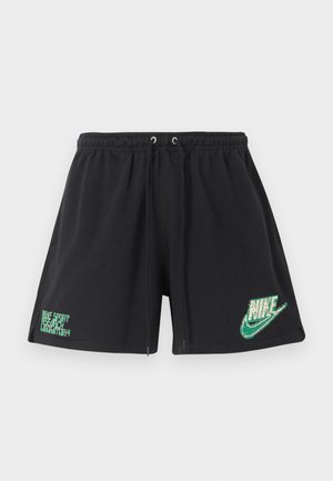 Shorts de sport noirs avec taille élastique et cordon de serrage, ornés de logos Nike verts aux coins inférieurs avant.