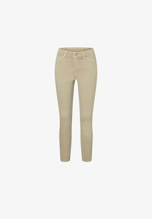 Beige skinny jeans with a smooth texture, five-pocket design, and belt loops; features a button and zipper fly closure.