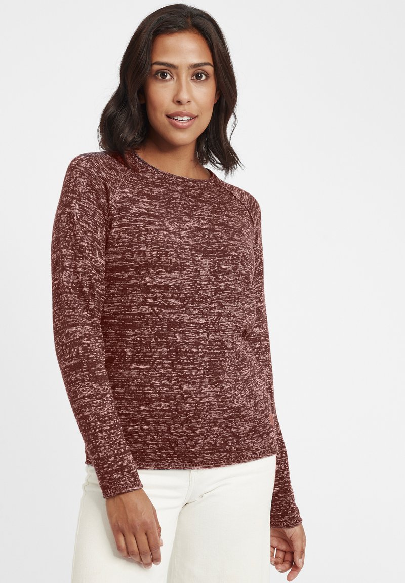 Maroon knit sweater with a textured, speckled pattern, featuring long sleeves and a round neckline. Suitable for casual wear.