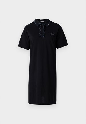 Black short-sleeve dress made of cotton, featuring a patterned collar, buttoned placket, and embroidered logo detail on the chest.