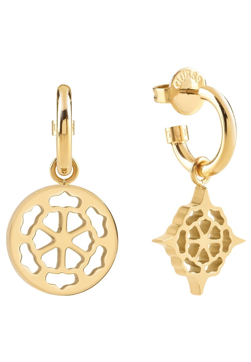 Boucles d'oreilles en or en forme de créoles, présentant deux pendentifs distincts : l'un est circulaire avec un motif floral découpé, l'autre est en forme d'étoile avec des détails similaires.