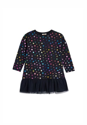 Schwarzes Kleid mit langen Ärmeln, ausgestattet mit mehrfarbigen Sternmustern und einem Tüllrüschensaum. Weicher Stoff mit rundem Ausschnitt.