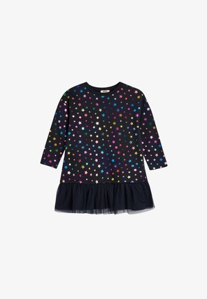 Vestido negro de mangas largas, con patrones de estrellas multicolores y un dobladillo de tul con volantes. Tejido suave con cuello redondo.