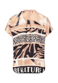 Blouse à manches courtes en tissu lisse avec un fond beige, ornée d'imprimés animaux graphiques en noir et marron, et d'un détail de texte en gras.