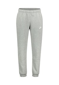Grå Nike sweatpants gjorda av mjukt tyg, med elastisk midja, muddar vid anklarna och en vit logotyp på vänster lår.