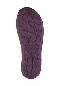Purple rubber sole with textured tread pattern, featuring grooves and ridges for grip. Suede upper with side accents.