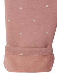 Rosa Baumwollleggins mit kleinen goldenen Herzmustern und einem weichen Fleece-Bündchen am Knöchel, mit einer glatten, dehnbaren Textur.