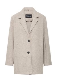Beige wollen blendjas met een geknikte kraag, twee zijzakken en een sluiting aan de voorkant met twee zwarte knopen. Zachte, gestructureerde afwerking.