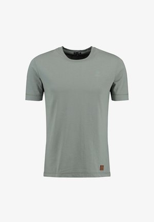 Camisa de algodón verde claro con mangas cortas, cuello redondo y un pequeño detalle de logo. Presenta dobladillos cosidos y un acabado de tela texturizada.