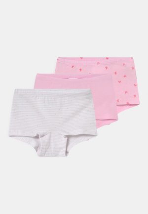 Three pairs of kid's shorts in lightweight fabric: one white with pink stripes, one solid pink, and one pink with small pink designs.