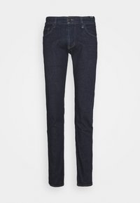 Mörkblå denimjeans med slim fit, enfärgad, minimal sömnad och klassisk femfickdesign. Har dragkedja och bälteshällor.