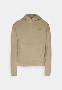 Felpa con cappuccio beige, dotata di tasca frontale a canguro, cappuccio con cordoncino, polsini e orlo a coste, e piccolo logo coordinato sul petto.