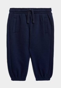 Granatowe dresy z elastycznym pasem i sznurkiem do regulacji, dwiema bocznymi kieszeniami oraz ściągaczami przy kostkach.