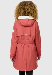 Red waterproof jacket with a fitted waist, hood, adjustable sleeves, and white accents. Features a pronounced back design with a flap.