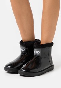 HUGO Botas para la nieve - black